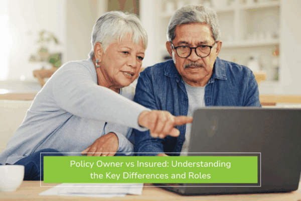 Senior couple planning on laptop in living room with insurance document explaining difference between policyowner vs insured