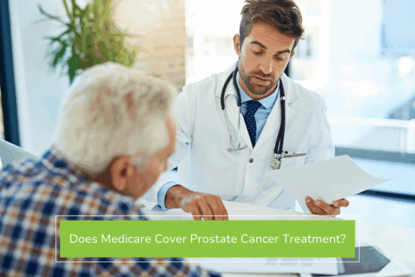 Older man discussing if medicare covers prostate cancer with his doctor