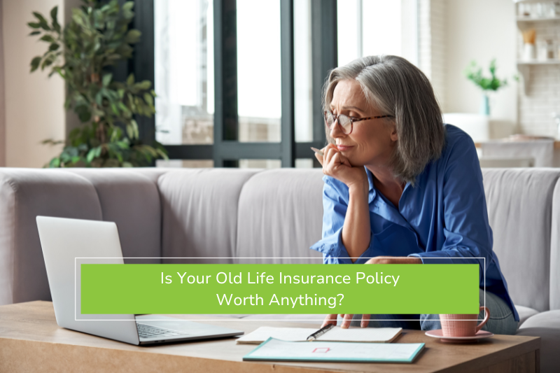 Older woman looking at her life insurance policy on her laptop