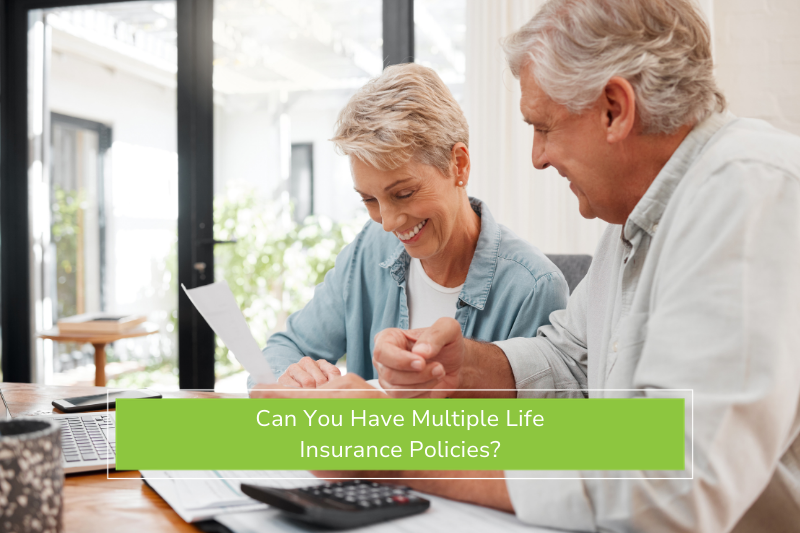Older couple organizing paperwork about can you have multiple life insurance policies